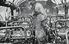 Gutted Bus Anniston Alabama A fireman probes charred interior - 1961 Old Photo picture
