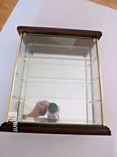 preowned wood cabinet for mini Swarovski figurines,mirror back. picture