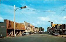 East Tawas Michigan~Main Street~Ben Franklin~Family Theatre~Hardware~1960s Cars picture