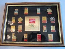 COCA COLA 16TH ANNNIVERSARY OLYMPIC WINTER GAMES PINBACK COLLECTION - FRAMED picture