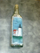 Lovely 750ML Cork Bottle Featuring a Lighthouse, Gulls and over 1000 Sea Shells picture