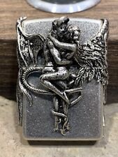 Handmade craftsmanship zippo lighter with angel and devil design picture