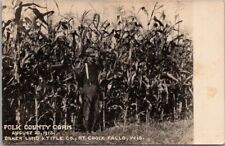 c1910s ST. CROIX FALLS, Wisconsin RPPC Photo Postcard BAKER LAND & TITLE CO Corn picture