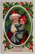 Santa Claus Holds Happy Child~Holly~Antique Embossed Christmas Postcard~k100 picture