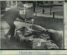 1968 Press Photo Anti-war demonstrator throws gasoline on stolen draft records picture