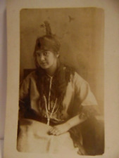 vintage unmailed post card showing woman in Native clothing and feather on head picture