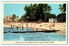 c1960's Having Fun In The Atlantic Ocean Pompano Beach Florida FL Trees Postcard picture