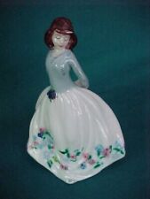 VTG.  GIRL FIGURINE VICTORIAN DRESS HANDS BEHIND BACK HOLDING FLOWERS 5 3/8 INCH picture