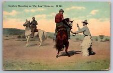 Postcard Cowboy Mounting an Out Law Broncho Western Cowboys Wearing Chaps picture