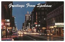 Greetings from Spokane Washington c1950's night, business district, Sprague St. picture
