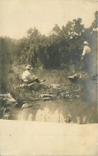 C-1910 Men fishing hole Sports Recreation Postcard 20-4794 picture