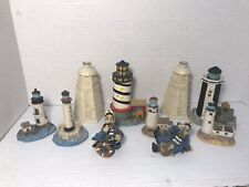Lighthouse Beach Figurines  Lot Of 8 Lighthouses And 2 Sailors Ceramic picture