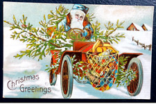 Blue Robe Santa Claus~in Old Car with Toys~Tree~Antique Christmas Postcard~k127 picture