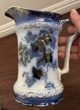 Antique Flow Blue Pitcher With Gold Accents picture