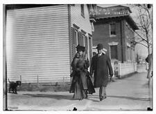 Photo:Mrs. W.G. Brokaw and her counsel A.J. Baldwin walking on sidewalk picture