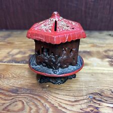 Vintage Coin Bank Red Carousel Merry Go Round Spinning Cast Iron Scroll  5 1/2