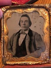 Sharp 1/6th size tintype of young man in brass mat/frame picture