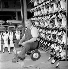 Man sitting on toy tractor Tri-ang factory Merton South London 1965 Old Photo picture
