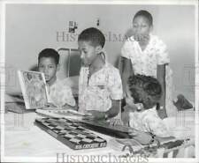 1956 Press Photo Children checking out board games at a hospital - afa50256 picture