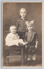 RPPC Three Blonde Haired Sisters In Studio c1910  Real Photo Postcard picture