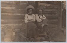 Postcard RPPC Rustic Hillbilly Couple Posing Log Cabin Jug 
