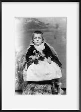 Photo: Harrison Morton Marquardt,Small child,holding flowers picture