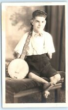 POSTCARD RPPC c1930s Man with Banjo Deformed Legs and Arms Studio Photo Johney picture