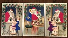 Quality ~Lot of 3~SILK SANTA CLAUS~with~Children~Dolls~Christmas~Postcards~h609 picture