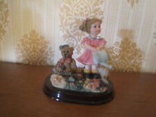 Garden girl with teddy, water can figurine picture