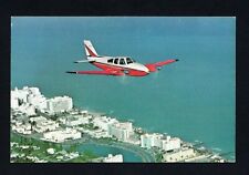 Beechcraft Model 55 Baron Over Miami Beach Florida Postcard 5.5
