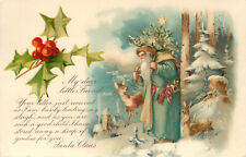 Christmas Postcard Green Robed Santa Claus Carries Christmas Tree Winter Scene picture