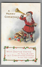 J.P. 1917 Merry Christmas Santa Blowing Horn Embossed Postcard  Not Posted picture