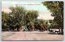 Hutchinson Kansas~Automobile Approaches Horse & Buggy~First Avenue~c1910 PC picture