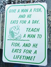 sign humorous funny Teach a man to fish and he eats for a lifetime picture