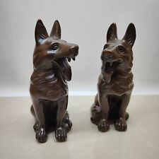 A pair of brass imitation purple copper Wangcai dogs picture