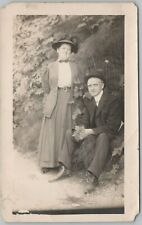 Postcard RPPC 1900s Woman Standing Man Sitting Portrait Couple Family      picture