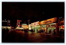 c1950's Night View Lighted Shops Boardwalk Atlantic City New Jersey NJ Postcard picture