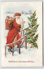 Postcard Christmas Embossed Santa Walking in Snow with Toys picture