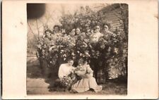 RPPC Women Hiding Peeking Out From Flowering Bushes c1910 photo postcard FP6 picture