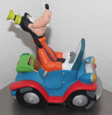 Vintage Plastic Walt Disney Goofy Driving a Car Coin Bank Piggy Bank PREOWNED picture