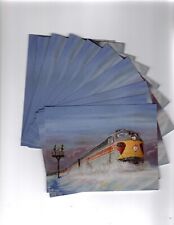10 postcards of a painting of Erie Lackawanna E units in the Snow.  Railroad picture
