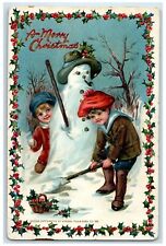 c1910's Christmas Boys Snowman Pipe Holly Berries Embossed Tuck's Postcard picture