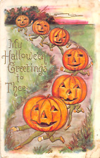 c.1910 Jack O' Lantern Headed Men in Parade Halloween post card Whitney picture