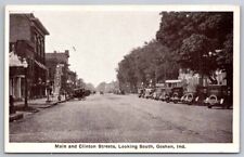 eStampsNet Goshen IN Main & Clinton Street Scene with Cars Postcard  picture