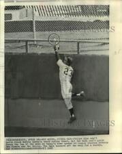 1962 Press Photo Felipe Alou tries to reach ball during a game in Milwaukee picture