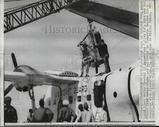 1962 Press Photo Elizabeth City NJ Iron lung is hoisted from COast Guard plane. picture