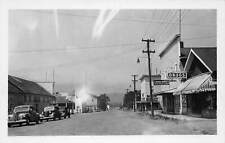 J85/ Oakridge Oregon RPPC Postcard c1940s Main Street Drug Store Autos 91 picture