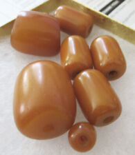 7 VINTAGE BUTTERSCOTCH AMBER BAKELITE BEADS, 43 GRAMS, 1.12 INCHES, .93 INCH picture