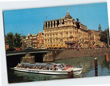 Postcard Damrak met Victoria Hotel Amsterdam Netherlands picture