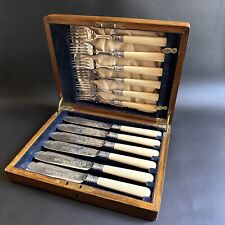 STUNNING SET OF 6x VINTAGE WOODEN BOXED FAUX BONE HANDLE FISH KNIVES & FORKS picture
